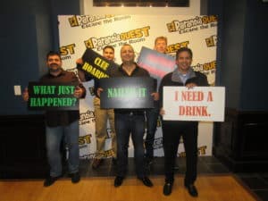 Group of participants with signs all around